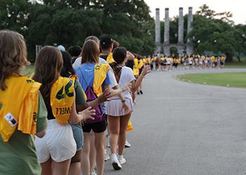 students in line at a university event