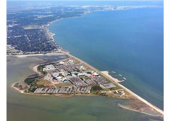 aerial view of a coastal town and shoreline