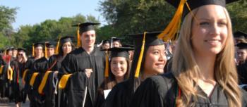 graduates marching in cap and gown