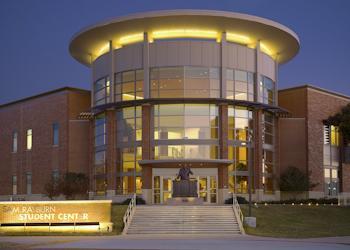 entrance of student center building at twilight