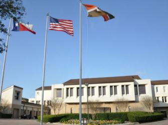 flags in front of campus building