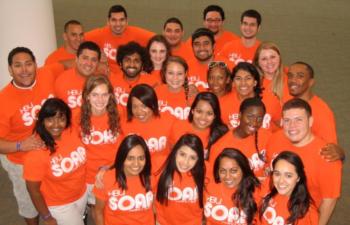 group in orange t-shirts