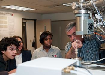 students observing a lab demonstration