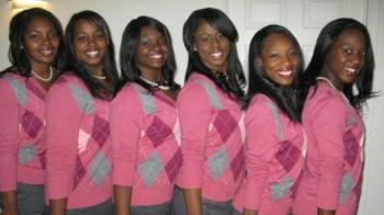 five women in pink tops