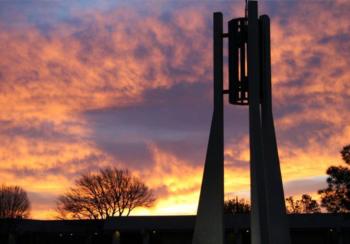 artistic sculpture against twilight sky