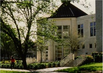 path leading to a campus building with trees