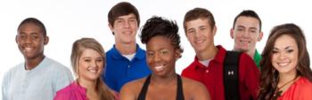 diverse group of students smiling at the camera