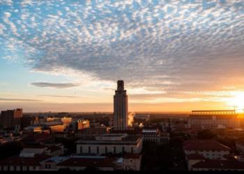 sunrise over university tower and campus