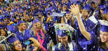 graduates celebrating with confetti