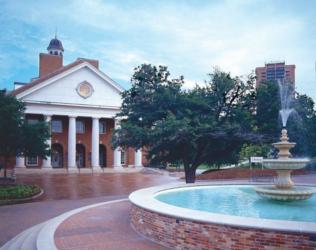 campus building with fountain in foreground