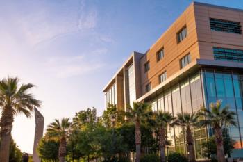 modern building with palm trees