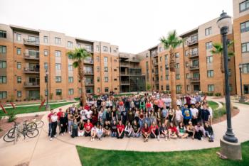 group of students in front of residence