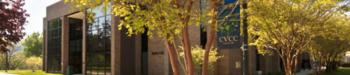 modern campus building with trees