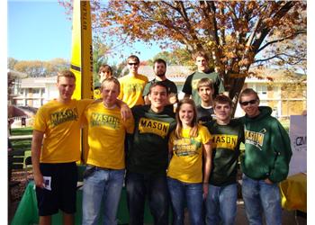 group of students wearing mason shirts