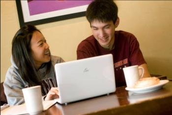 students with laptop and coffee