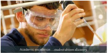 man in lab gear doing research