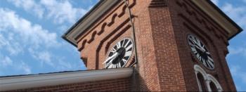 close-up of brick clock tower