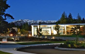 evening view of campus building with mountains