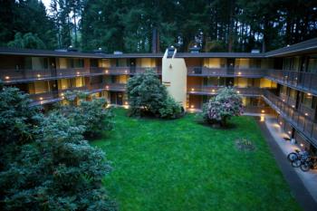 courtyard view of a residential building at dusk