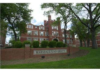 brick building with 'marshall university' sign