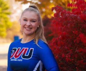 cheerleader in a 'OVU' uniform