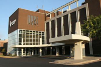 building facade with large windows and overhang