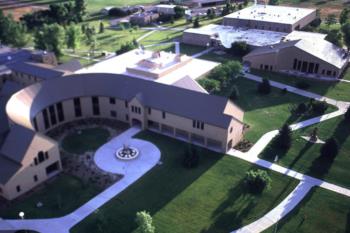 aerial view of college campus with green courtyards