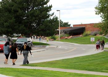 students walking on college campus