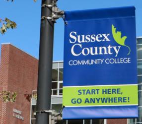 banner with college name and motto