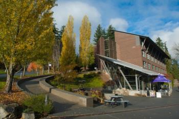 campus building with autumn foliage