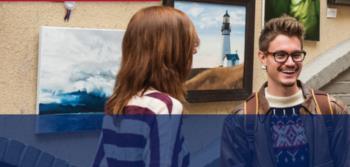 students at an art exhibition