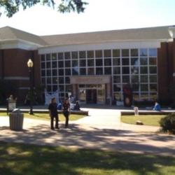 campus building with students outside