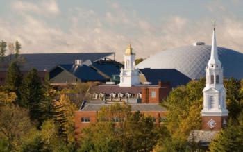 campus building with dome and church spire