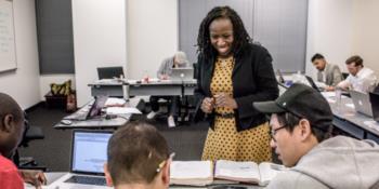 instructor teaching a group in a classroom