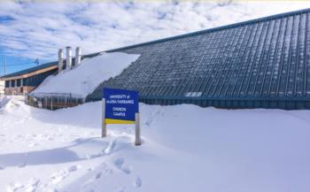 snowy campus with sign reading university of alaska fairbanks