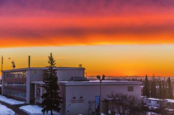 sunset view over a campus building