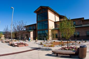 campus building with students walking