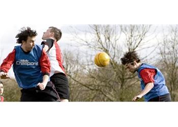 students playing a soccer match